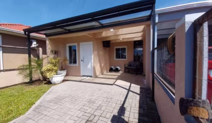 Casa 2 Dormitórios à venda no Bairro VILLAGE com 79 m² de área privativa - 2 vagas de garagem
