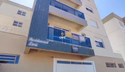 Apartamento 02  dormitórios com suíte, vaga de garagem, sacada e churrasqueira.