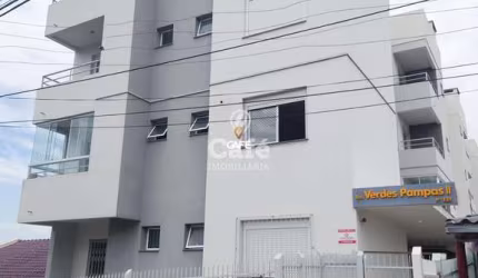 Apartamento 2 dormitórios, sendo um suíte, sacada com churrasqueira, Bairro noss