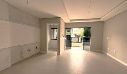 Apto NOVO de frente, com sacada ampla e garagem. Em Balneário Camboriú!