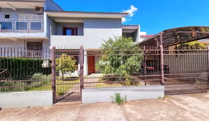 Ampla casa 3 dormitórios à venda no Bairro Juscelino Kubitschek