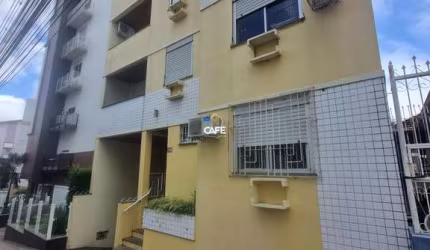 Apartamento dois dormitórios, sacada, churrasqueira, cozinha mobiliada