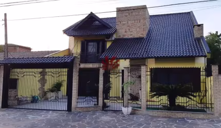 Casa com 3 quartos à venda na Rua João Nicolau, 109, Fátima, Canoas por R$ 1.490.000