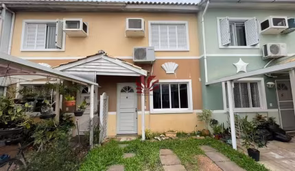 Casa em condomínio fechado com 3 quartos à venda na Avenida Santos Ferreira, 1180, Marechal Rondon, Canoas por R$ 399.000