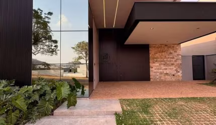 Casa térrea, no Condomínio Alphaville 1, com 3 suítes, 267m²