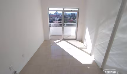 Apartamento com 2 dormitórios para alugar, 56 m² por R$ 2.317,36/mês - Barreiros - São José/SC