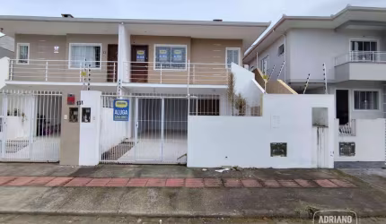 Casa com 3 dormitórios para alugar, 120 m² por R$ 3.671,65/mês - Potecas - São José/SC