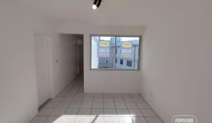 Apartamento com 2 dormitórios para alugar, 65 m² por R$ 2.407,79/mês - Campinas - São José/SC
