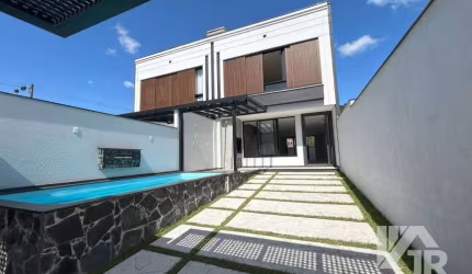 Casa de alto padrão com 3 suítes piscina a venda em Camboriú