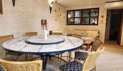 Village com 3 dormitórios à venda, 130 m² por R$ 2.660.000,00 - Riviera Módulo 21 - Bertioga/SP