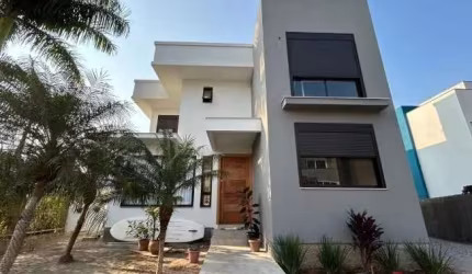 Casa em condomínio fechado com 4 quartos à venda no Cachoeira do Bom Jesus, Florianópolis  por R$ 2.395.000