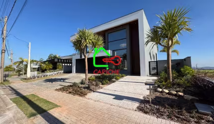 Casa de 4 Suítes em Condomínio de Alto Padrão em Monte Alegre, Vinhedo-SP: 452m², 3 Salas, 6 Banheiros e 4 Vagas.