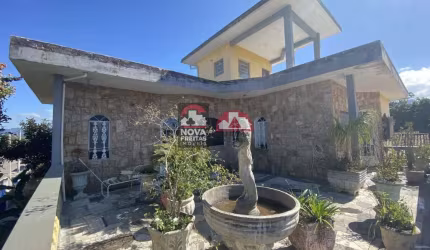 Locação e Venda de Casa - Padrão no bairro Pontal de Santa Marina em Caraguatatuba/SP
