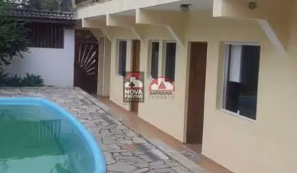 TERRENO COM SUÍTES