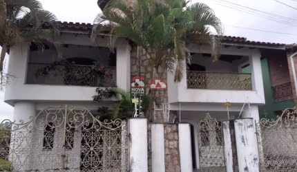 Excelente sobrado a 70 metros da praia do Indaiá .