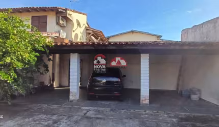 Sobrado com cinco dormitórios sendo quatro suites  e escritório no Porto Novo em Caraguatatuba