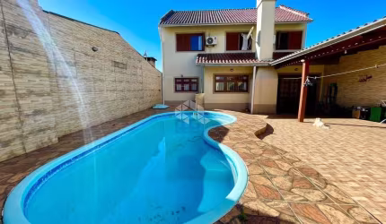 Casa com 3 quartos à venda na Rua Ernesto da Silva Rocha, 1254, Estância Velha, Canoas por R$ 585.000