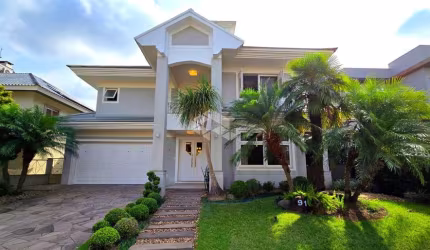 Casa em condomínio fechado com 3 quartos à venda na Rua Monte Castelo, 2007, Marechal Rondon, Canoas por R$ 2.890.000
