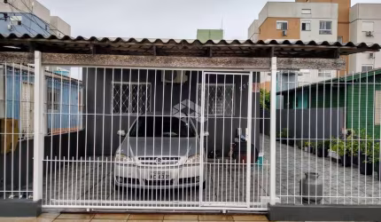 Casa com 4 quartos à venda na Rua Canela, 370, Estância Velha, Canoas por R$ 399.000