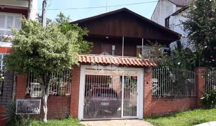 Casa com 4 quartos à venda na Avenida Doutor Sezefredo Azambuja Vieira, 5729, Olaria, Canoas por R$ 639.000