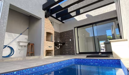 Casa térrea nova, com piscina, condomínio Villagio Ipanema 1