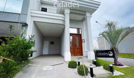Casa com 3 dormitórios e suite em condomínio fechado em Biguaçu/SC