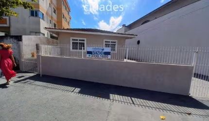Terreno em Forquilhinha com 3 casas construídas
