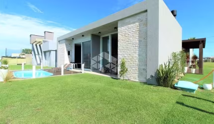Casa em condomínio fechado com 4 quartos à venda na Avenida Diamante, 1, Rainha do Mar, Xangri-Lá por R$ 2.229.900