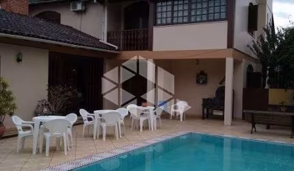Casa com 4 quartos à venda na Rua Professor Guerreiro Lima, 609, Partenon, Porto Alegre por R$ 2.149.880