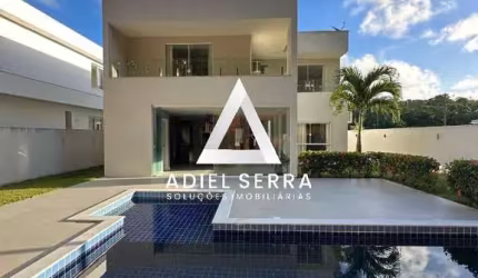 Alphaville litoral 3 - 4 quartos sendo 3 suítes - 2 lavabos - 4 vagas - Piscina e área gourmet - Sala ampla com pé direito duplo