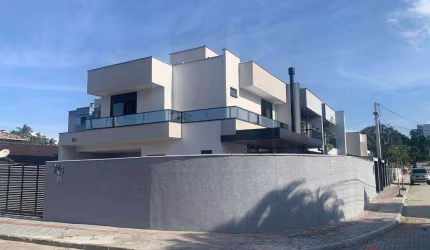 Casa com 3 dormitórios à venda, 146 m² por R$ 980.000 - Iririú - Joinville/SC