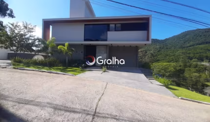 CASA EM CONDOMÍNIO- 4 SUÍTES