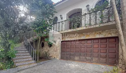 Casa tipo para venda com 4 quartos, sendo 3 suítes, 216m²
