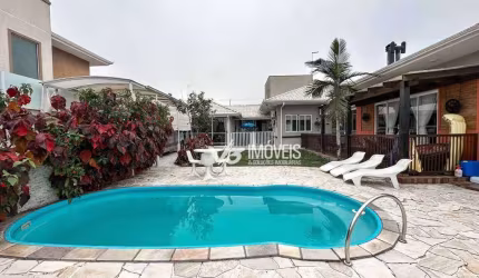 Casa com 5 dormitórios à venda, 300 m² por R$ 2.480.000,00 - Caiobá - Matinhos/PR