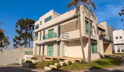 Casa alto padrão com 4 suítes, 285m² privativos, 2 vagas de garagem, no Bacacheri, Curitiba - PR.