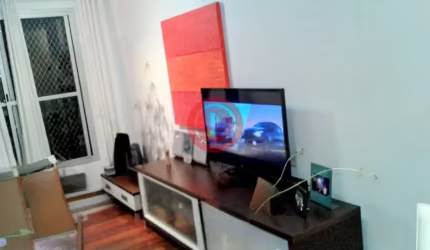 Apartamento de 50m2 com 2 quartos, sala 2 ambientes, cozinha e área de serviço e com 1 vaga de garagem para venda no Bairro Chácara Inglesa-SP!