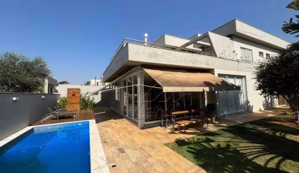 Excelente casa no Condomínio Reserva do Engenho, com 04 suítes. Piscina.