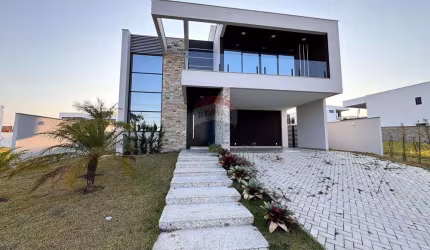 Fachada Imponente, Área Gourmet Integrada e 4 Suítes, Sua Casa dos Sonhos em Alphaville.