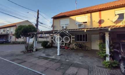 Casa em condomínio fechado com 2 quartos à venda no Rio Branco, Canoas  por R$ 259.000