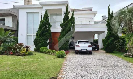 Casa em condomínio fechado com 4 quartos à venda na Central, 2500, Centro, Xangri-Lá por R$ 4.500.000