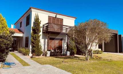Casa em condomínio fechado com 4 quartos à venda na Avenida Diamante, 1173, Rainha do Mar, Xangri-Lá por R$ 1.590.000