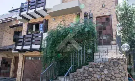 Casa em condomínio fechado com 3 quartos à venda na Rua Jaraguá, 355, Bela Vista, Porto Alegre por R$ 1.660.000