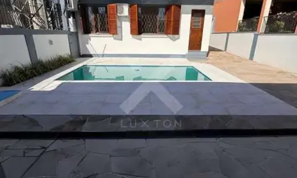 Casa com 3 quartos à venda na Engenheiro Ary de Abreu lima, 311, Jardim Europa, Porto Alegre por R$ 1.190.000