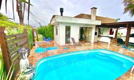 Casa com 2 quartos à venda na Rio Uruguai, 800, Centro, Xangri-Lá por R$ 500.000