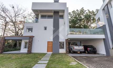 Casa em condomínio fechado com 3 quartos à venda na Avenida Coronel Marcos, 1239, Pedra Redonda, Porto Alegre por R$ 4.490.000