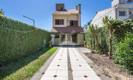 Casa em condomínio fechado com 4 quartos para alugar na Rua Chico Pedro, 191, Cristal, Porto Alegre por R$ 5.500
