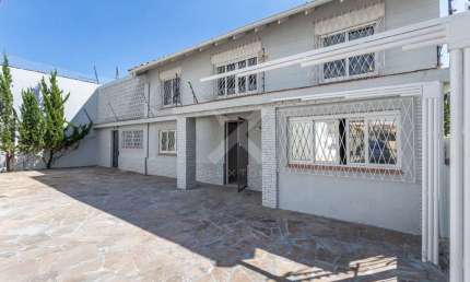 Casa comercial para alugar na Avenida São Paulo, 1059, São Geraldo, Porto Alegre por R$ 7.300