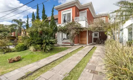 Casa em condomínio fechado com 3 quartos à venda na Avenida Juca Batista, 8000, Belém Novo, Porto Alegre por R$ 1.750.000