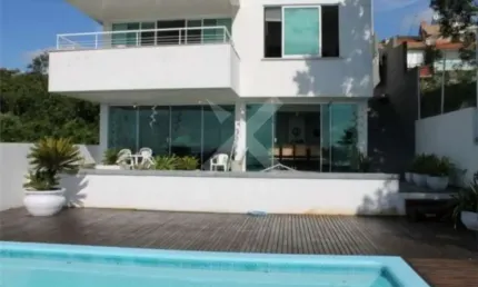 Casa com 3 quartos à venda na Alcebides Antonio dos Santos, 355, Nonoai, Porto Alegre por R$ 1.750.000