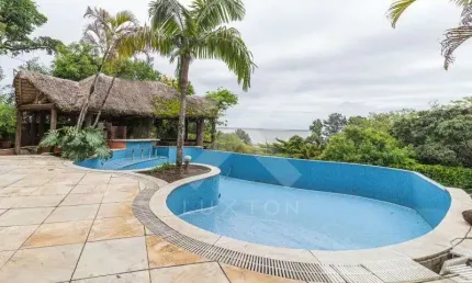 Casa com 5 quartos à venda na Rua Bororó, 301, Vila Assunção, Porto Alegre por R$ 4.800.000